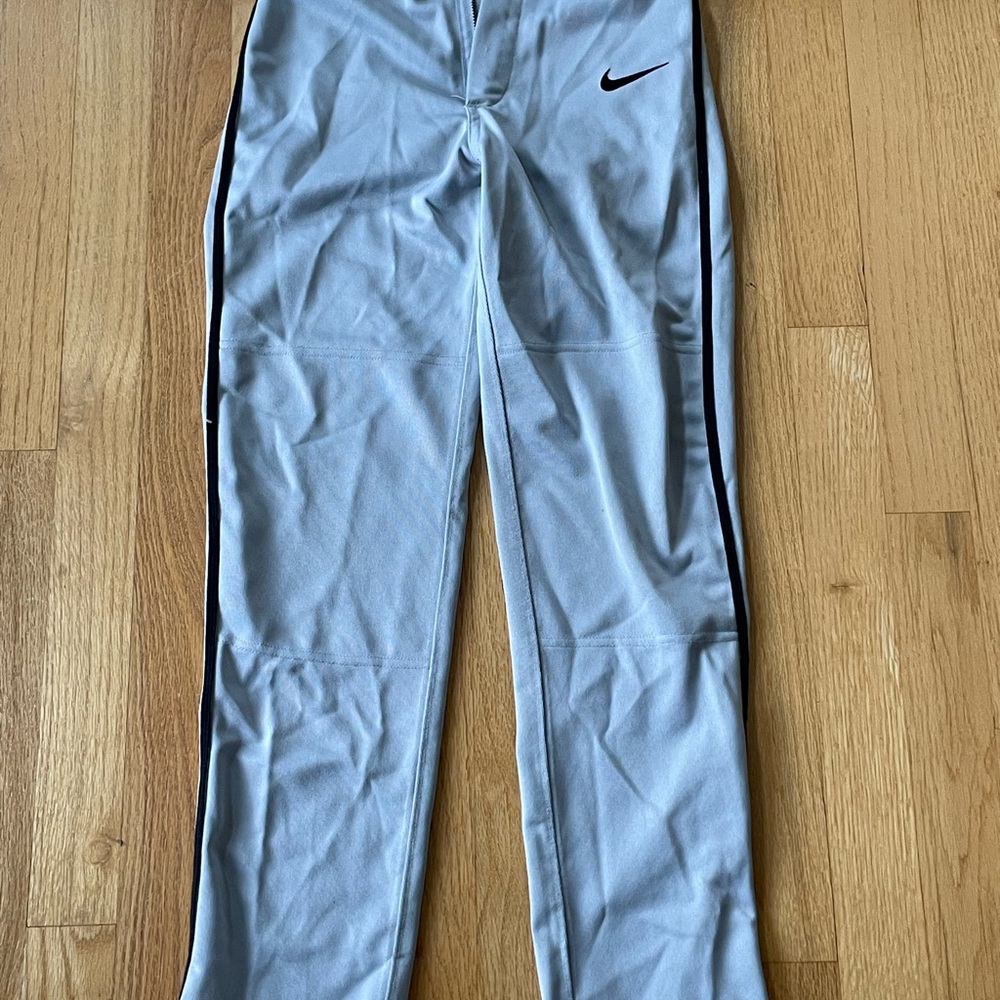 Nike Kids size M Gray Baseball Pants with black stripe, perfect for practice